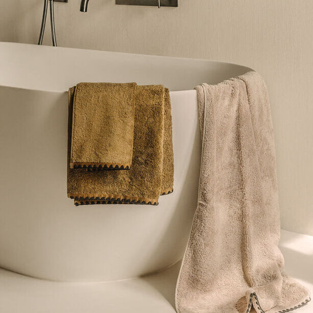 Linge de bain Haomy : serviettes, draps & tapis d’exception