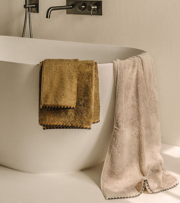 Linge de bain Haomy : serviettes, draps & tapis d’exception